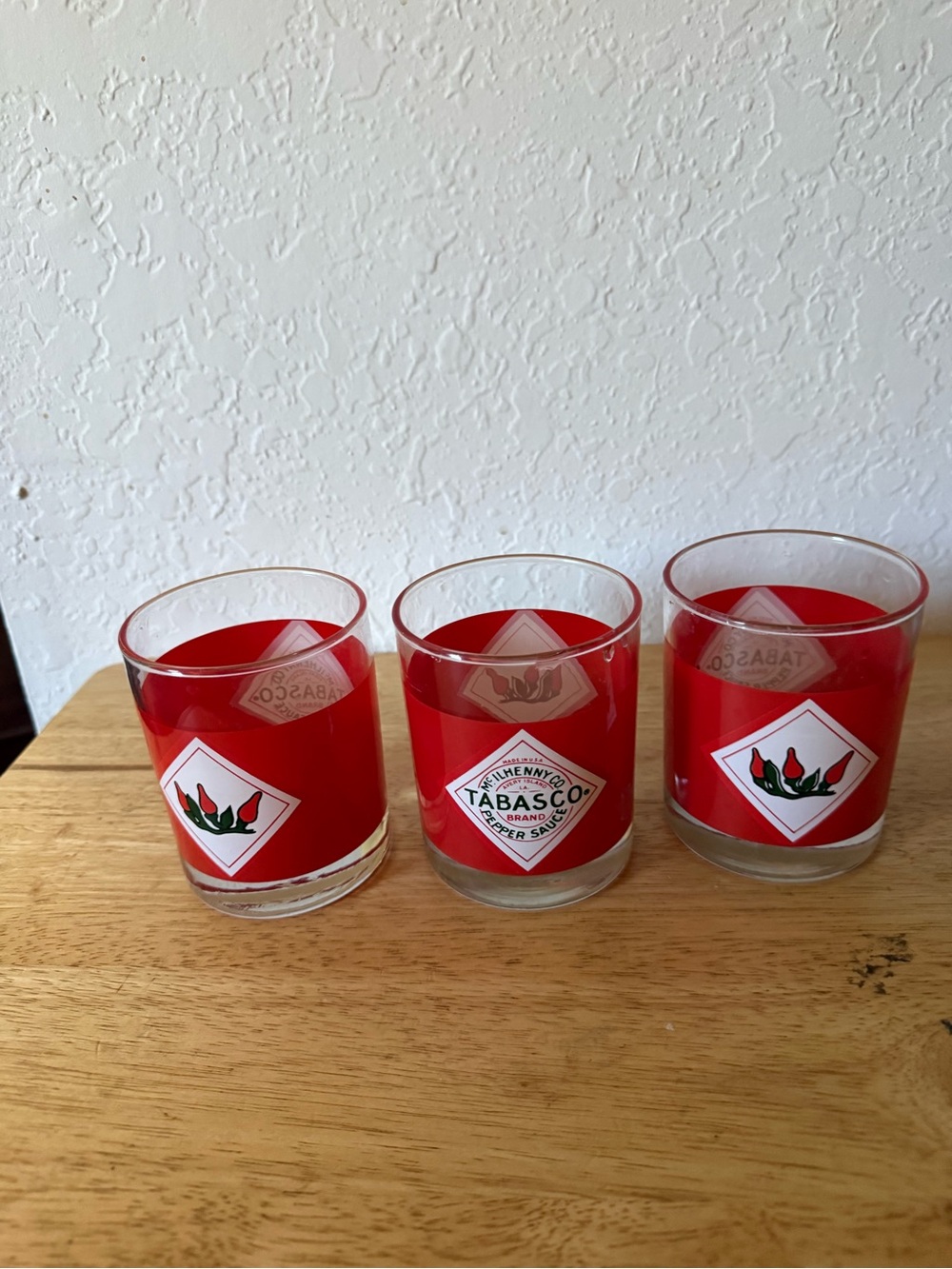 Tabasco Red Glass on the rocks Set with Pepper Logo.